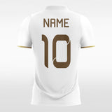 White and gold soccer jerseys